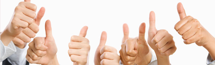 Group of people with thumbs pointing up in the air